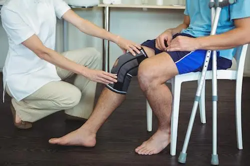 Manual therapy session focusing on spinal alignment and joint mobilization to prevent orthopedic surgery